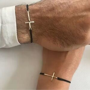 Elegant Black and Gold Cross Bracelet